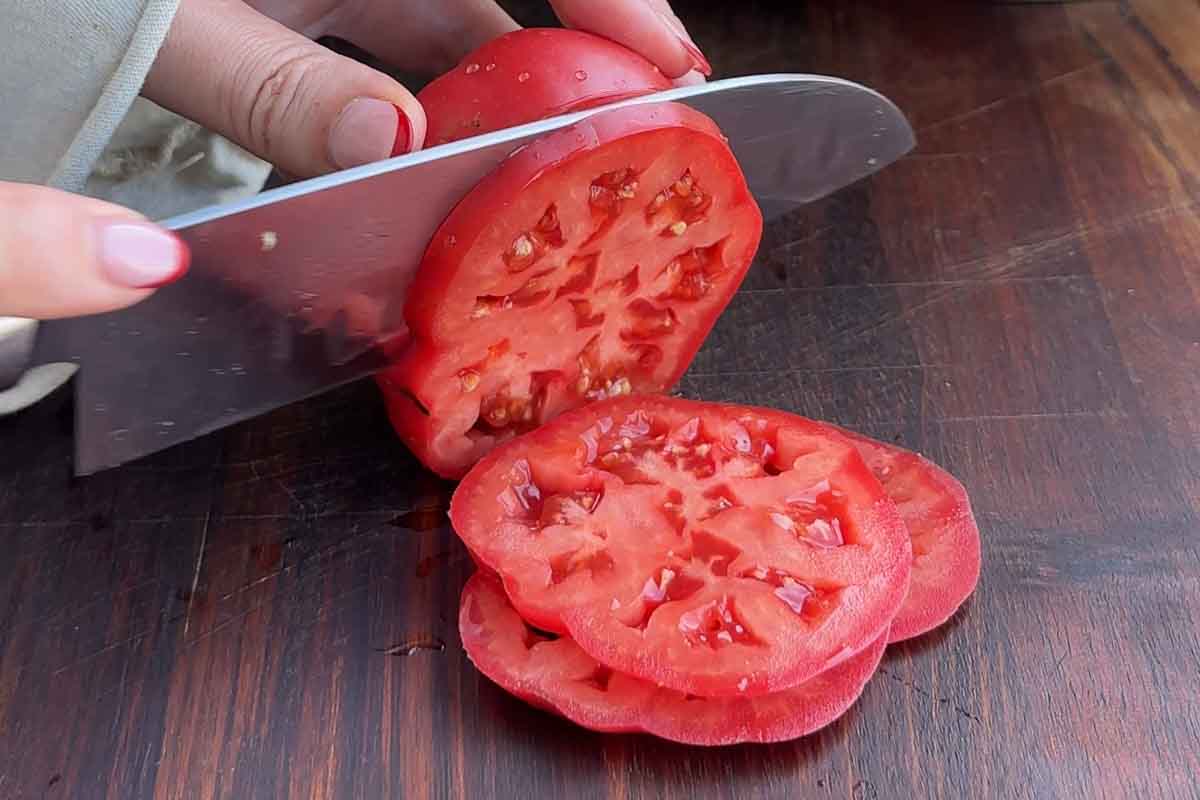 Cutting the tomatoes