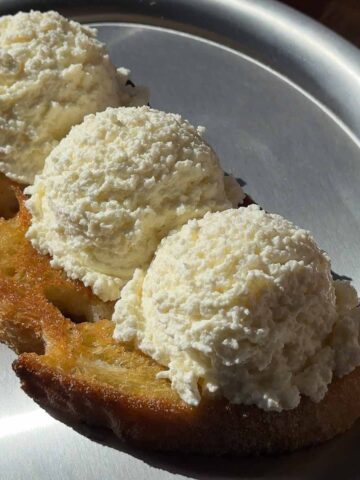 Creamy homemade cottage cheese served on toast