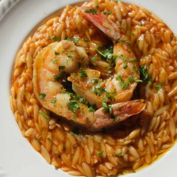 Golden saffron king prawn orzo with garlic, lemon and herbs