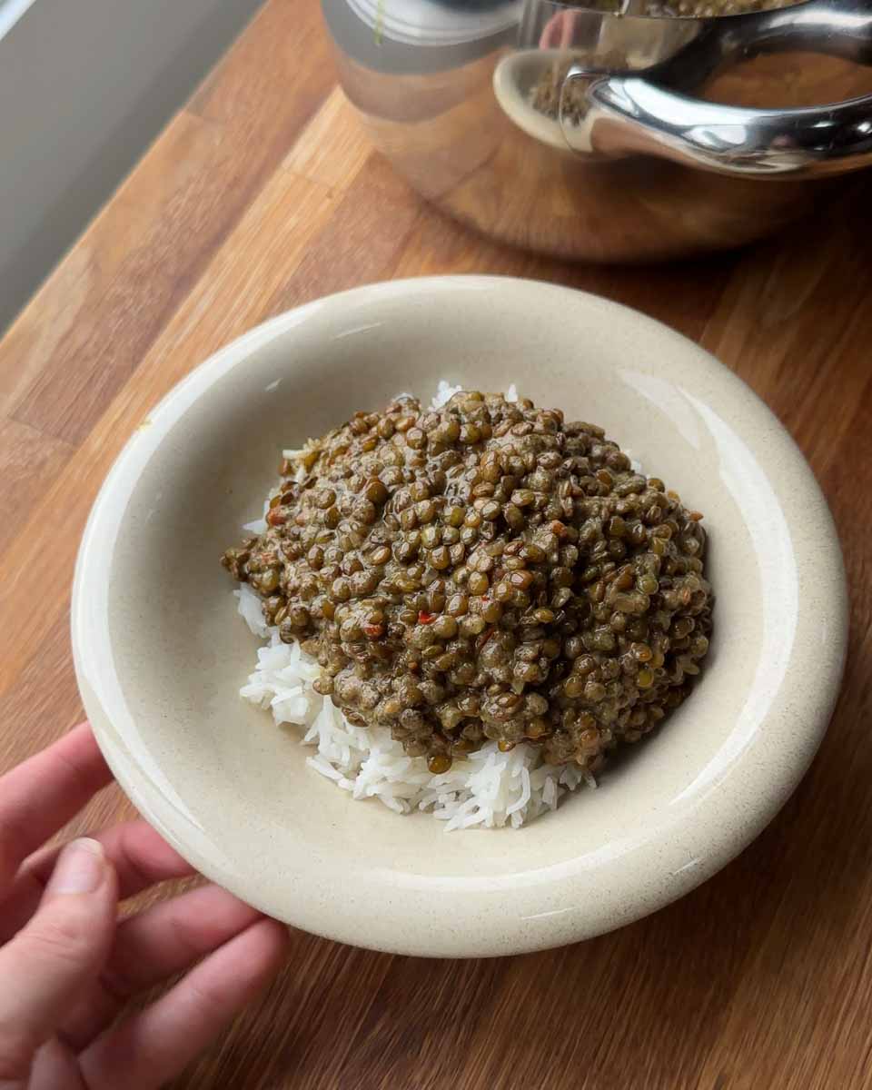 Bowl of creamy coconut lentil curry served with rice