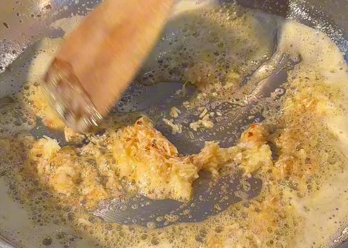 Garlic cooking in browned butter to start sweet soy butter sauce