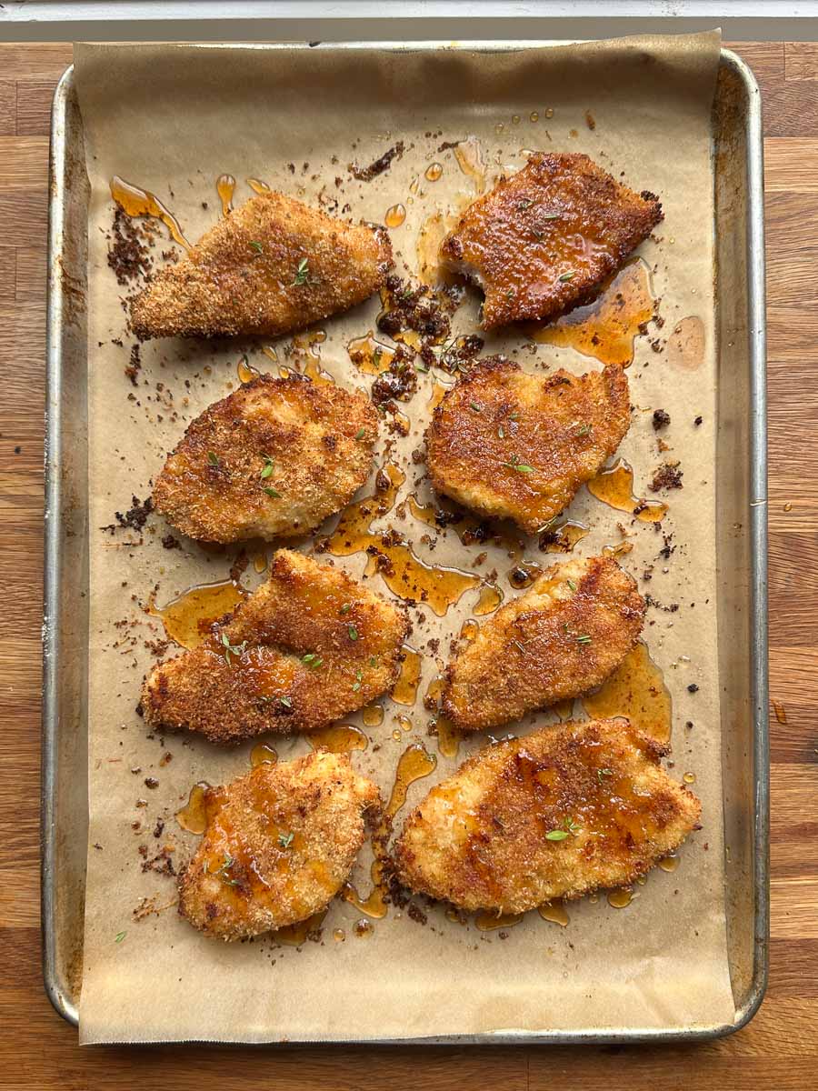 final hot honey parmesan chicken sitting on tray