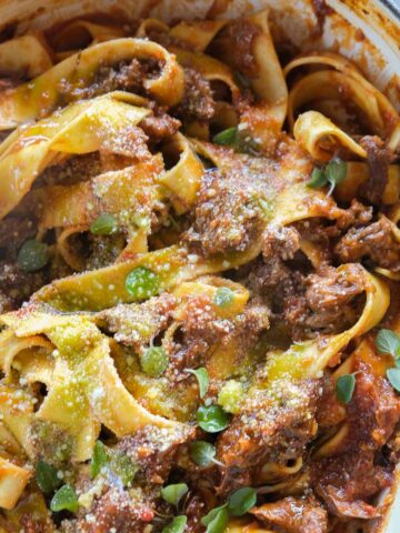 Boneless lamb shank rosé ragu with pappardelle topped with parmesan and oregano
