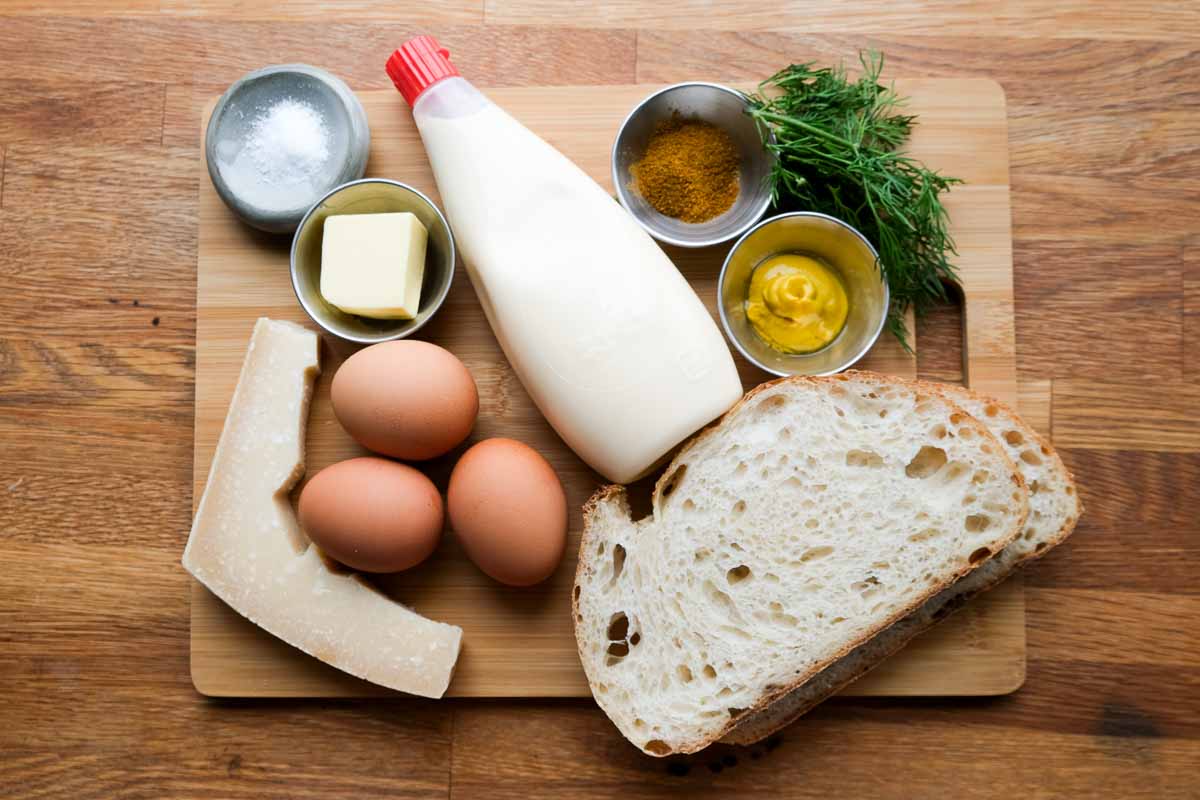 Ingredients for curried grated egg toastie including eggs, curry powder, mayonnaise and bread