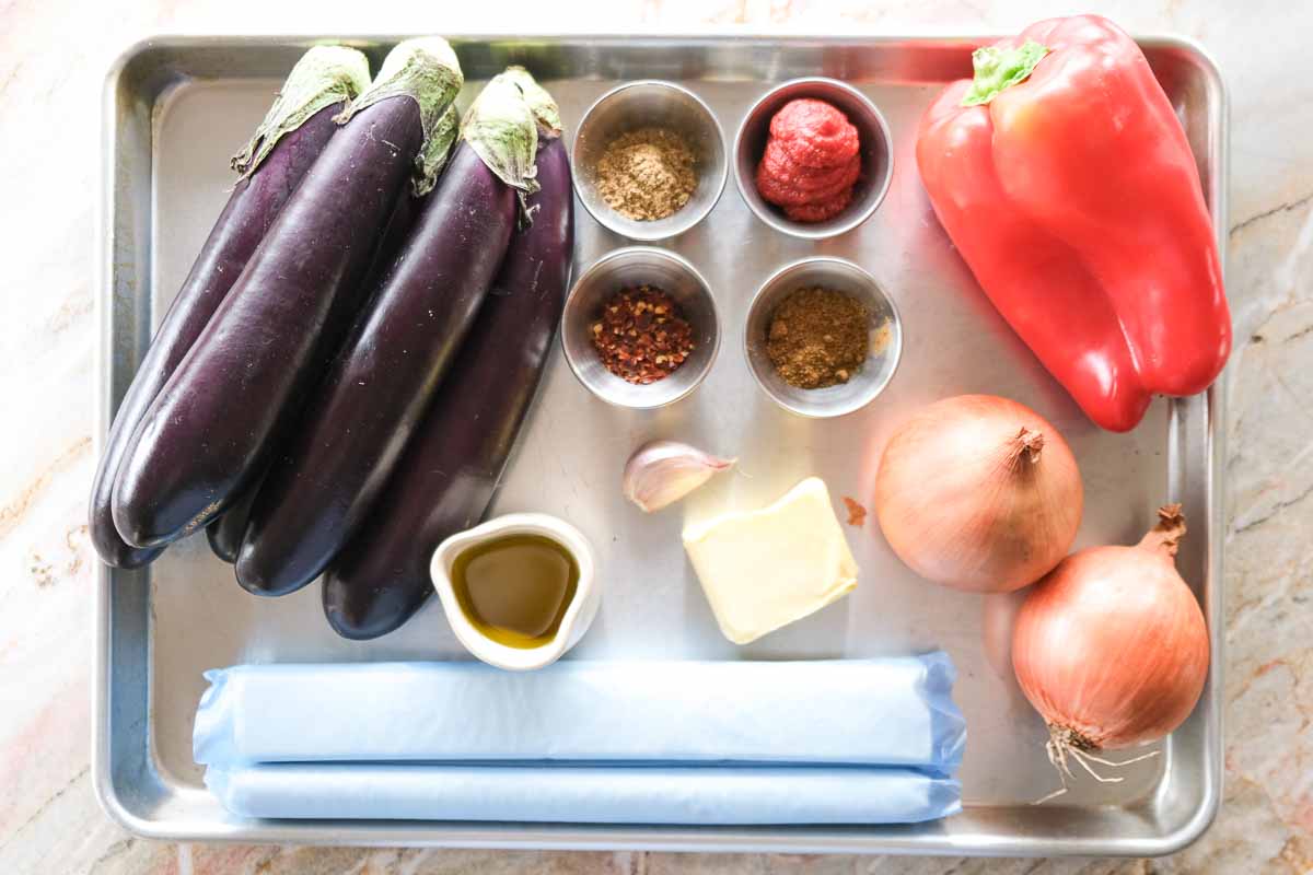 Ingredients for jammy eggplant börek including Lebanese eggplant, capsicum, onions, spices and filo pastry.