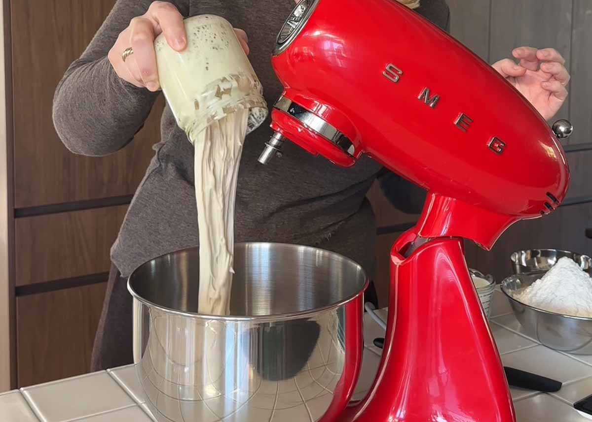 Sourdough scroll dough being mixed in a stand mixer.