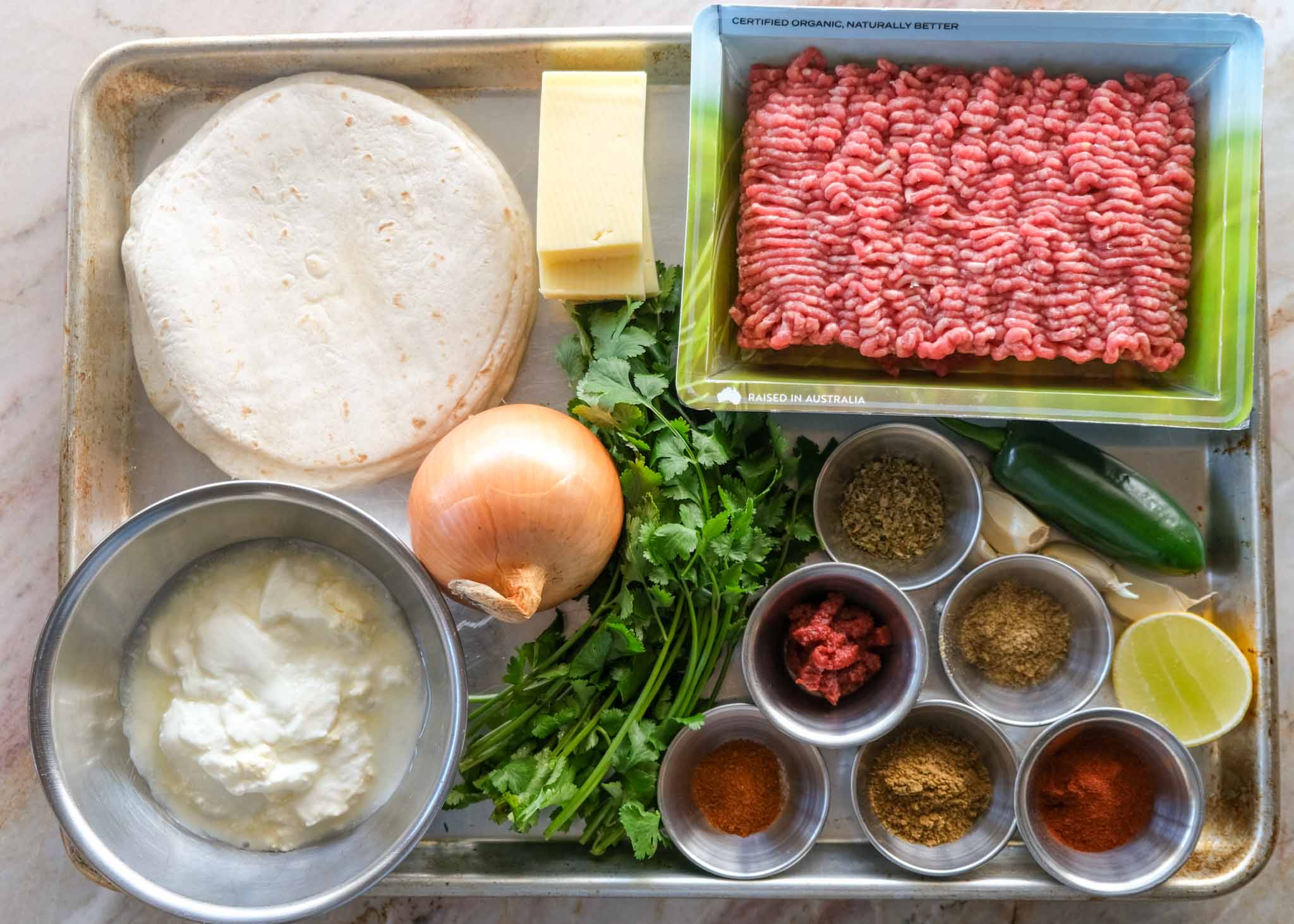 Ingredients for beef tacos with jalapeño coriander yoghurt