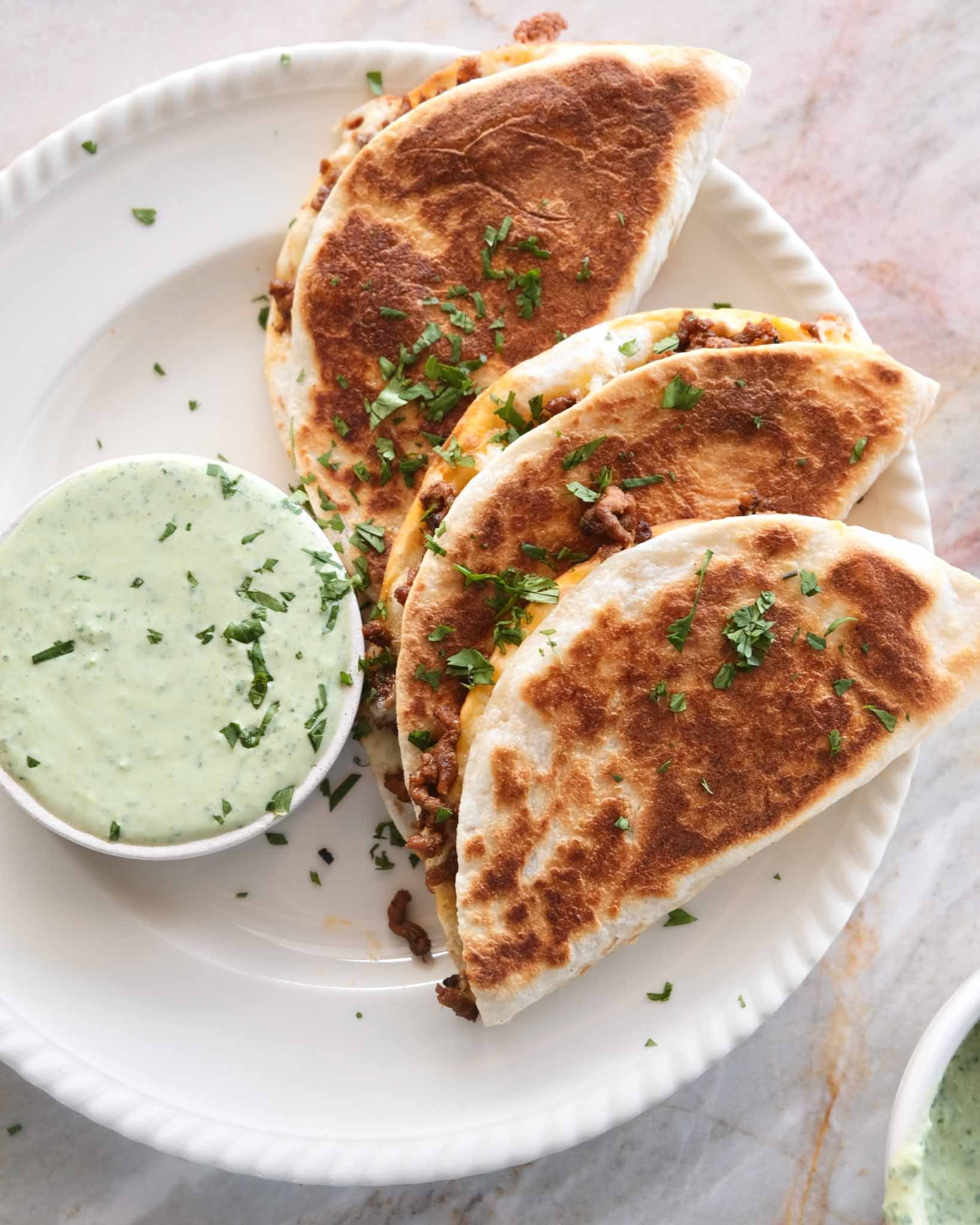 Crispy beef tacos served with jalapeño coriander yoghurt