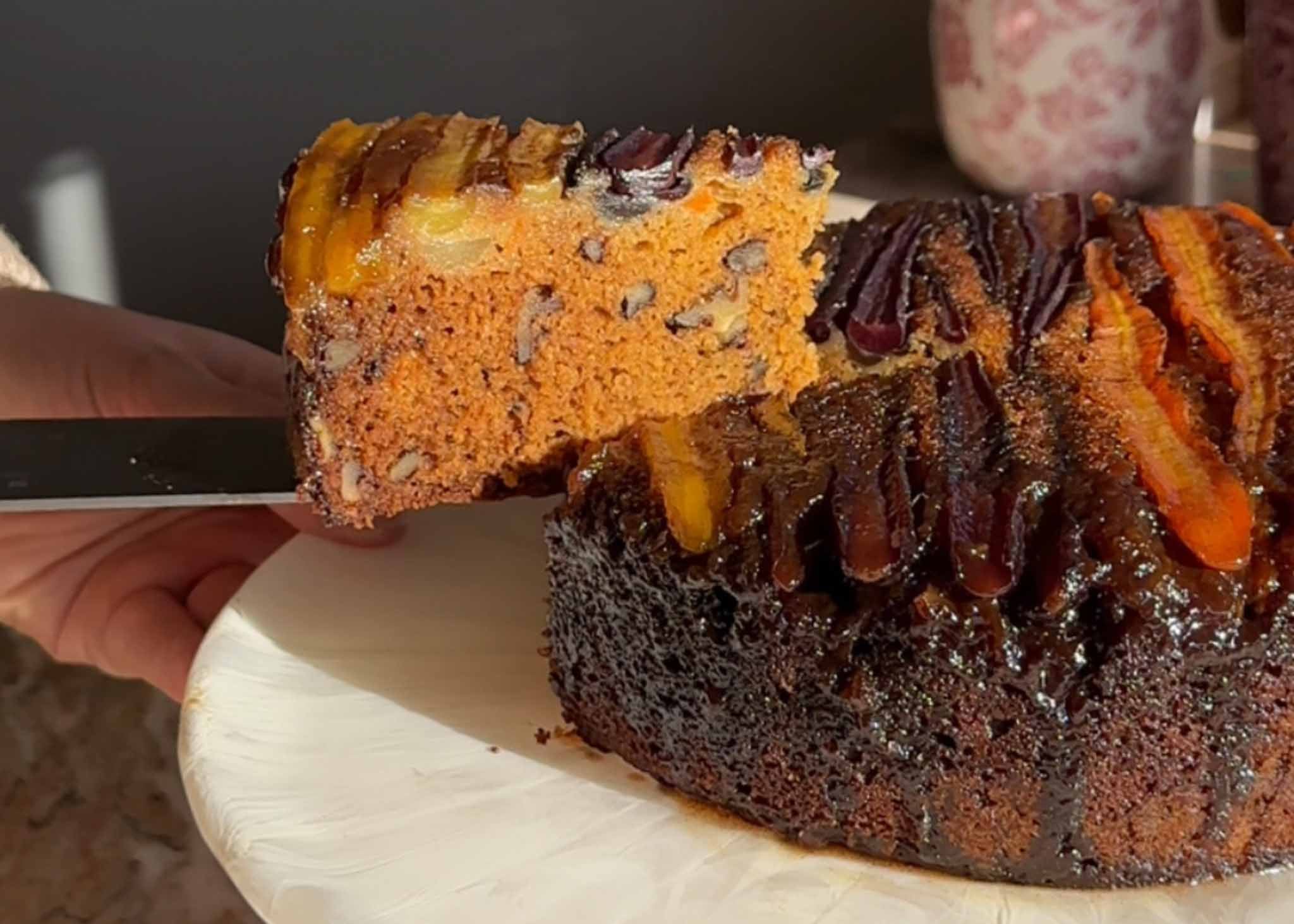Slice cut from the baked and cooled caramel upside-down carrot cake