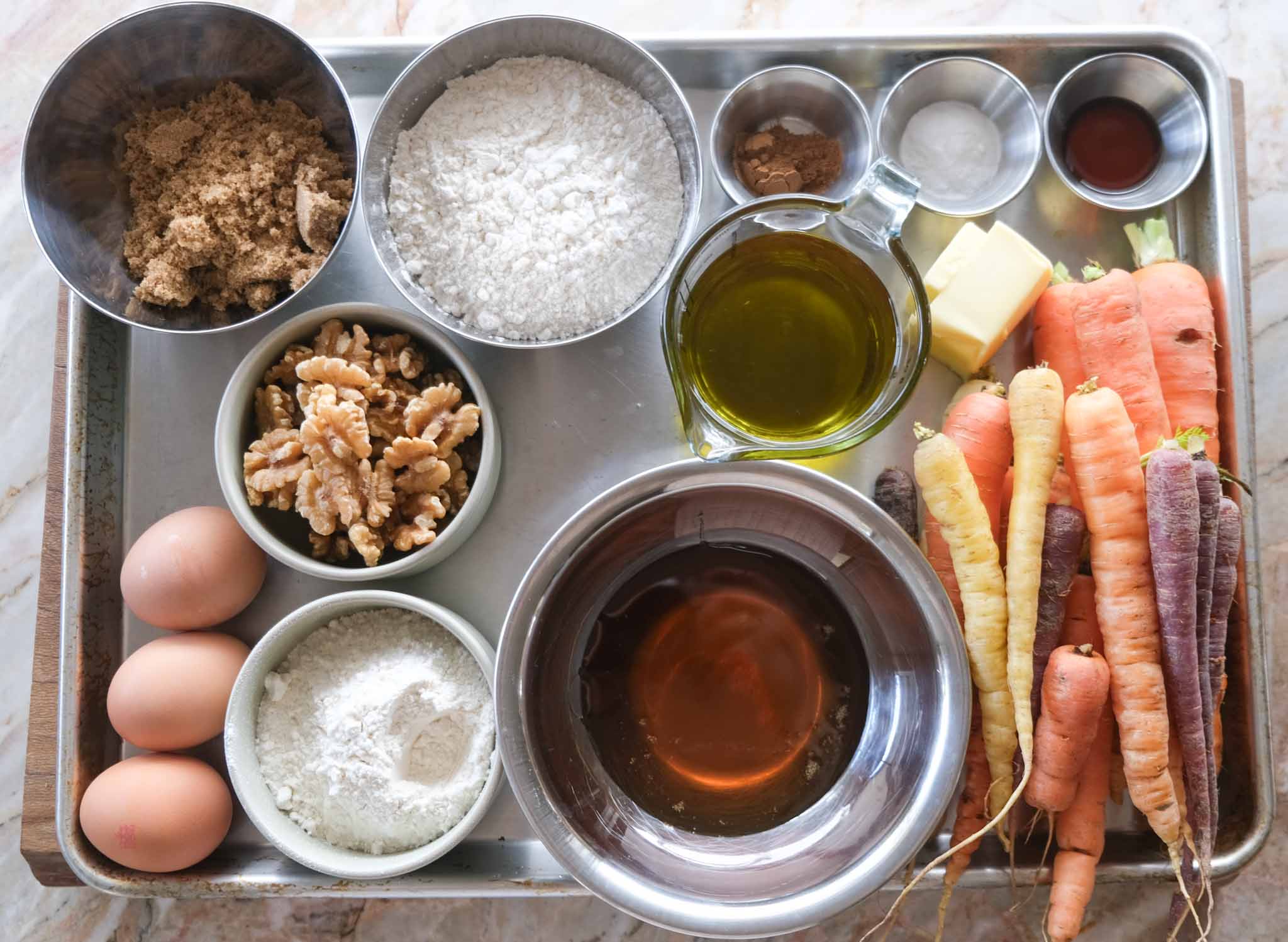 Ingredients for caramel upside-down carrot cake with Dutch carrots, walnuts and caramel sauce
