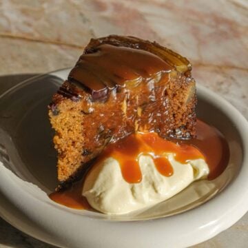 Caramel upside-down carrot cake with whipped cream cheese and caramel sauce